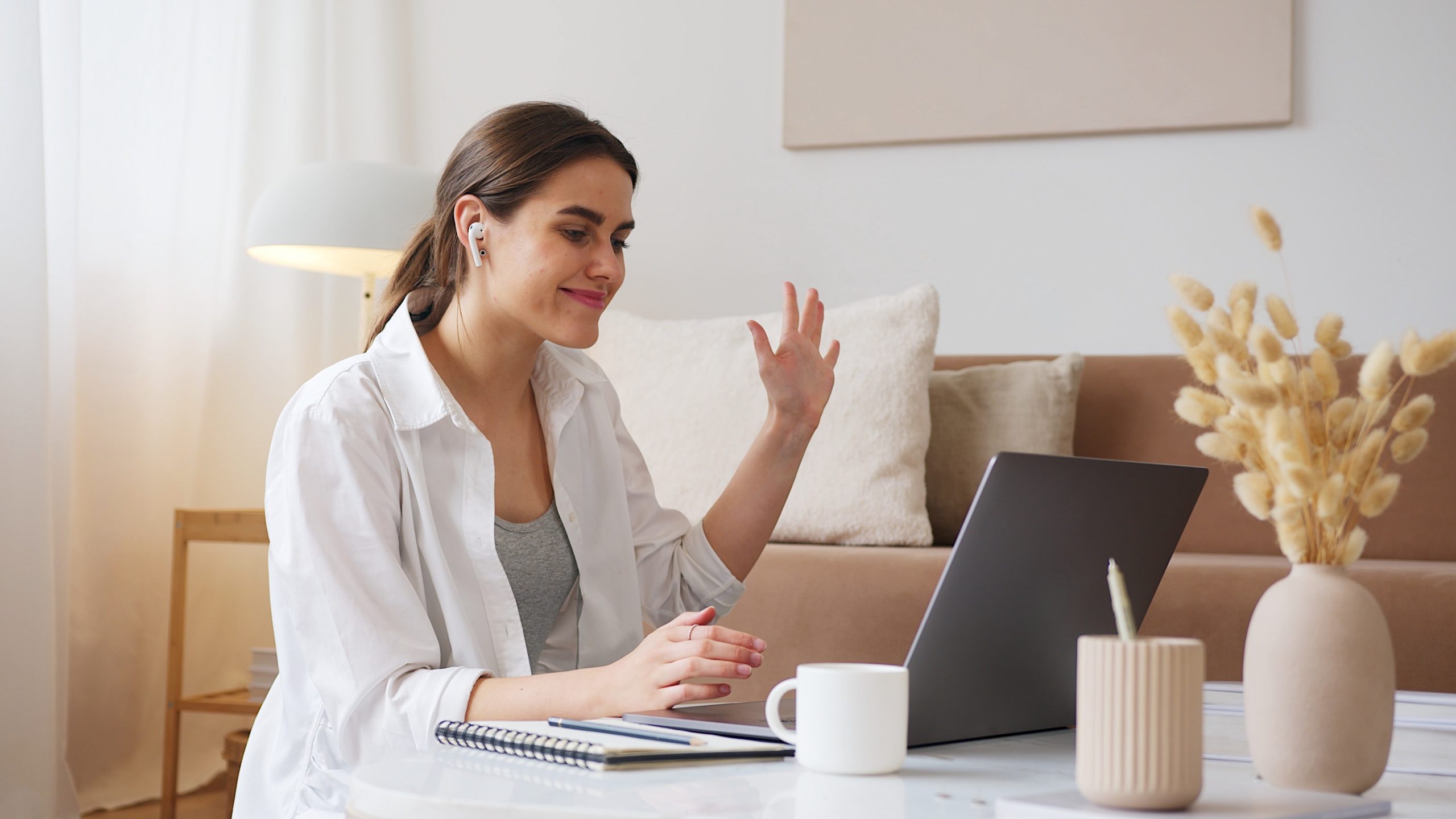 Woman working from home Smiling woman on video call
