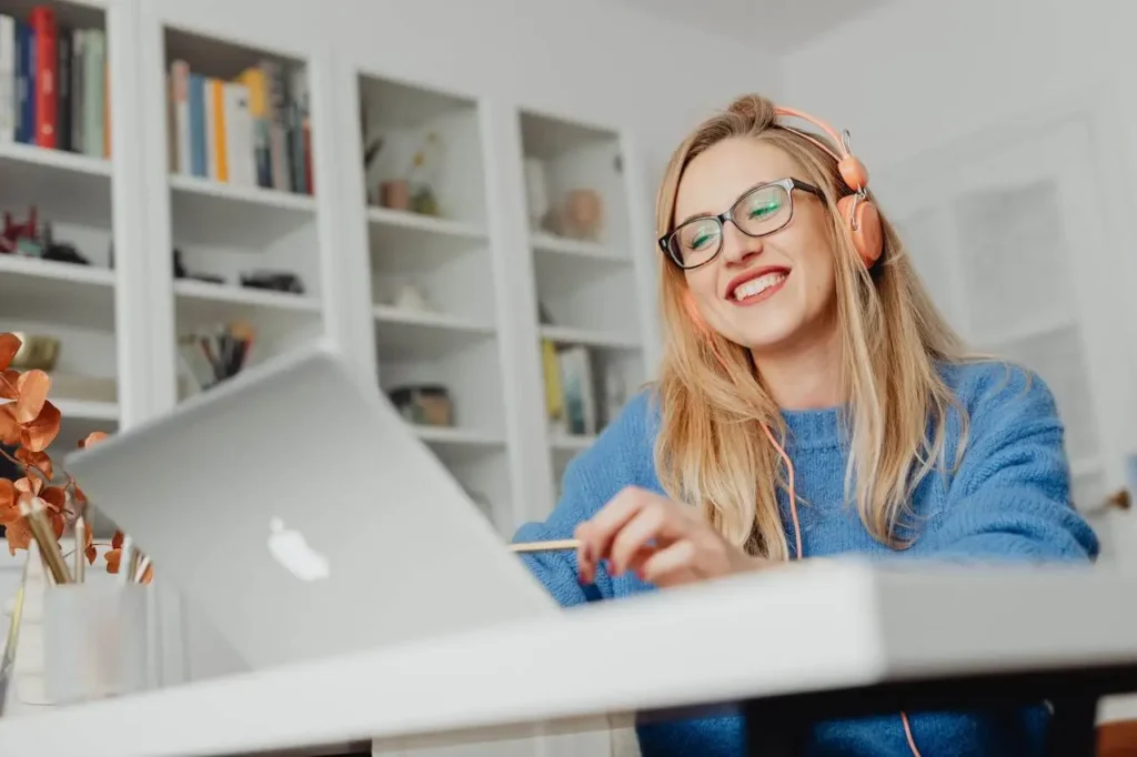 woman happily working from home