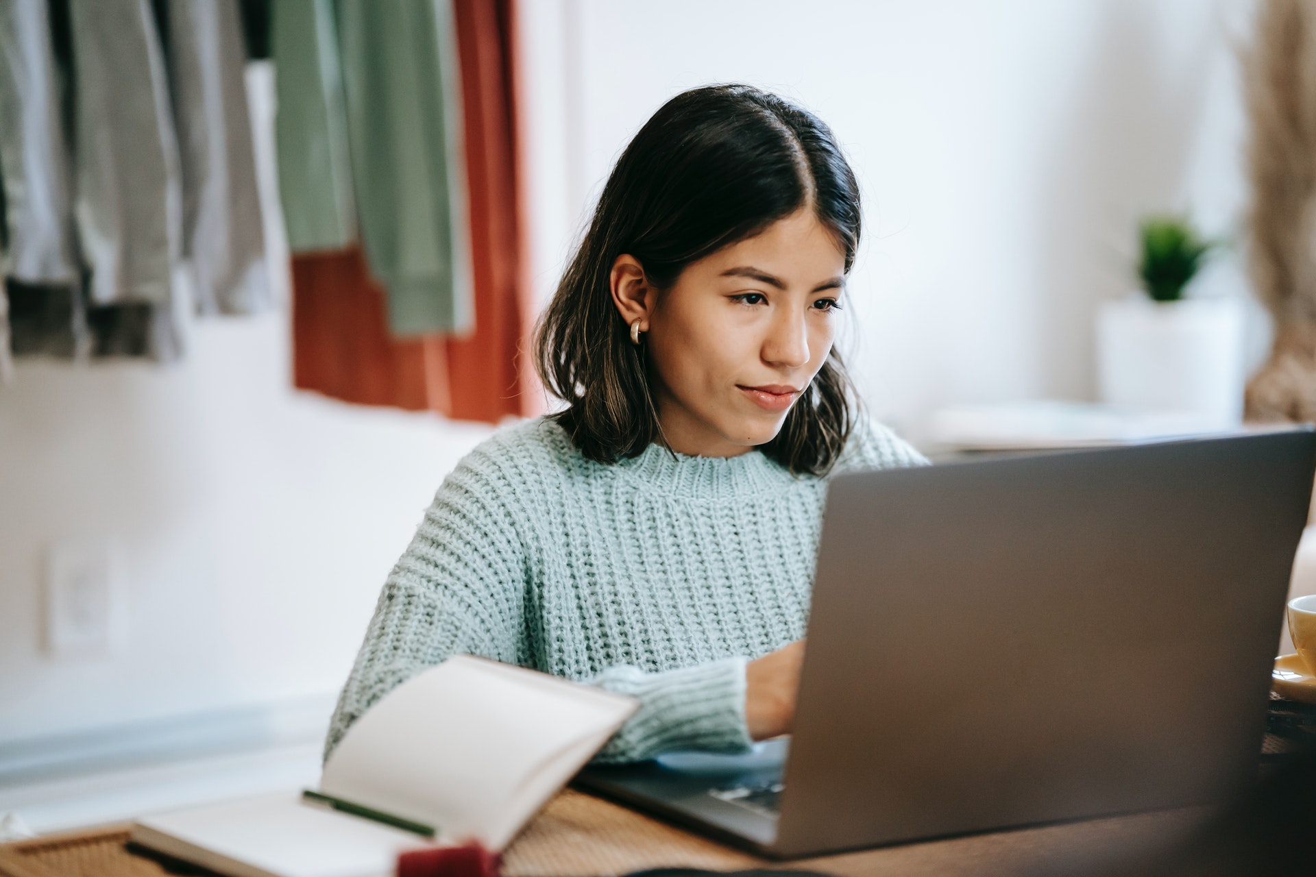 woman-using-computer Woman using HR software on laptop