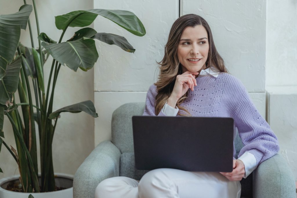 Professional woman sitting and thinking