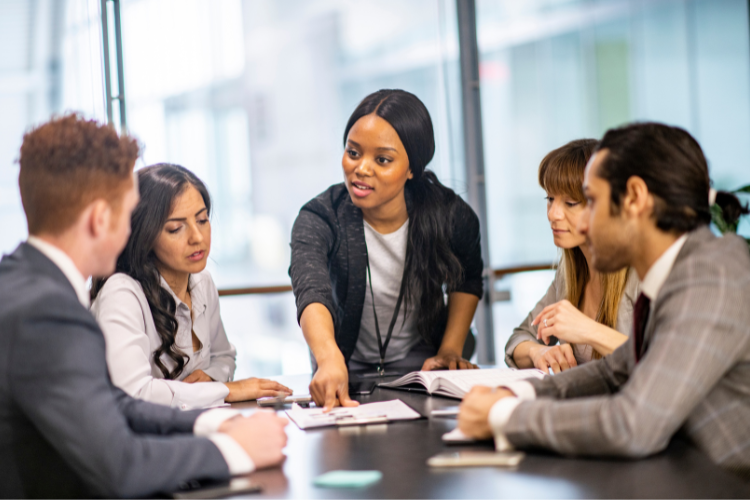 five-diverse-people-meeting Diverse professionals discussing leadership values