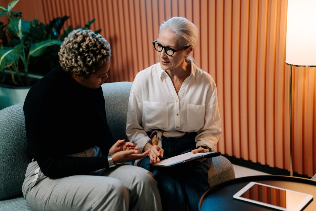 Woman with her manager having a one-on-one meetings