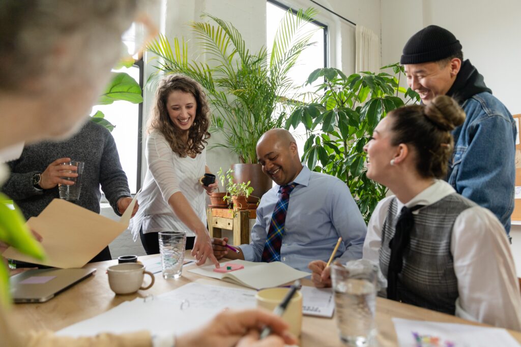 Happy workers in a meeting having a pleasant discussion