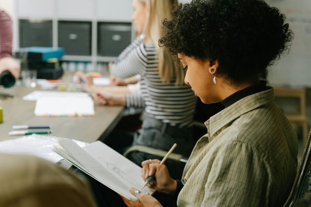 Employees attending a meeting