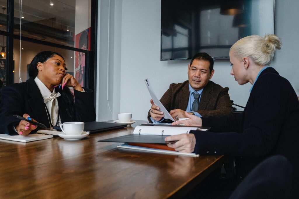 Managers discussing how to apply 5S to team performance management