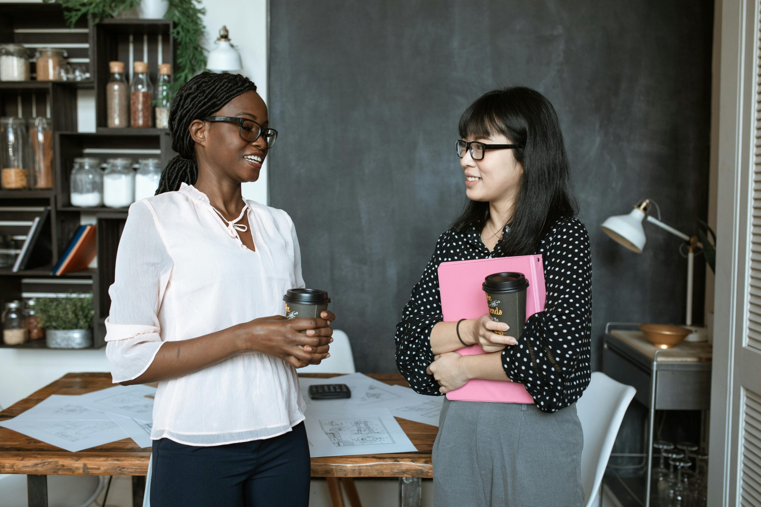 Two multiethnic women during mentorship program