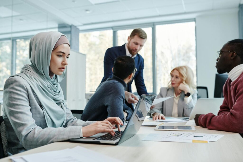 Manager looking over temporary employee performance